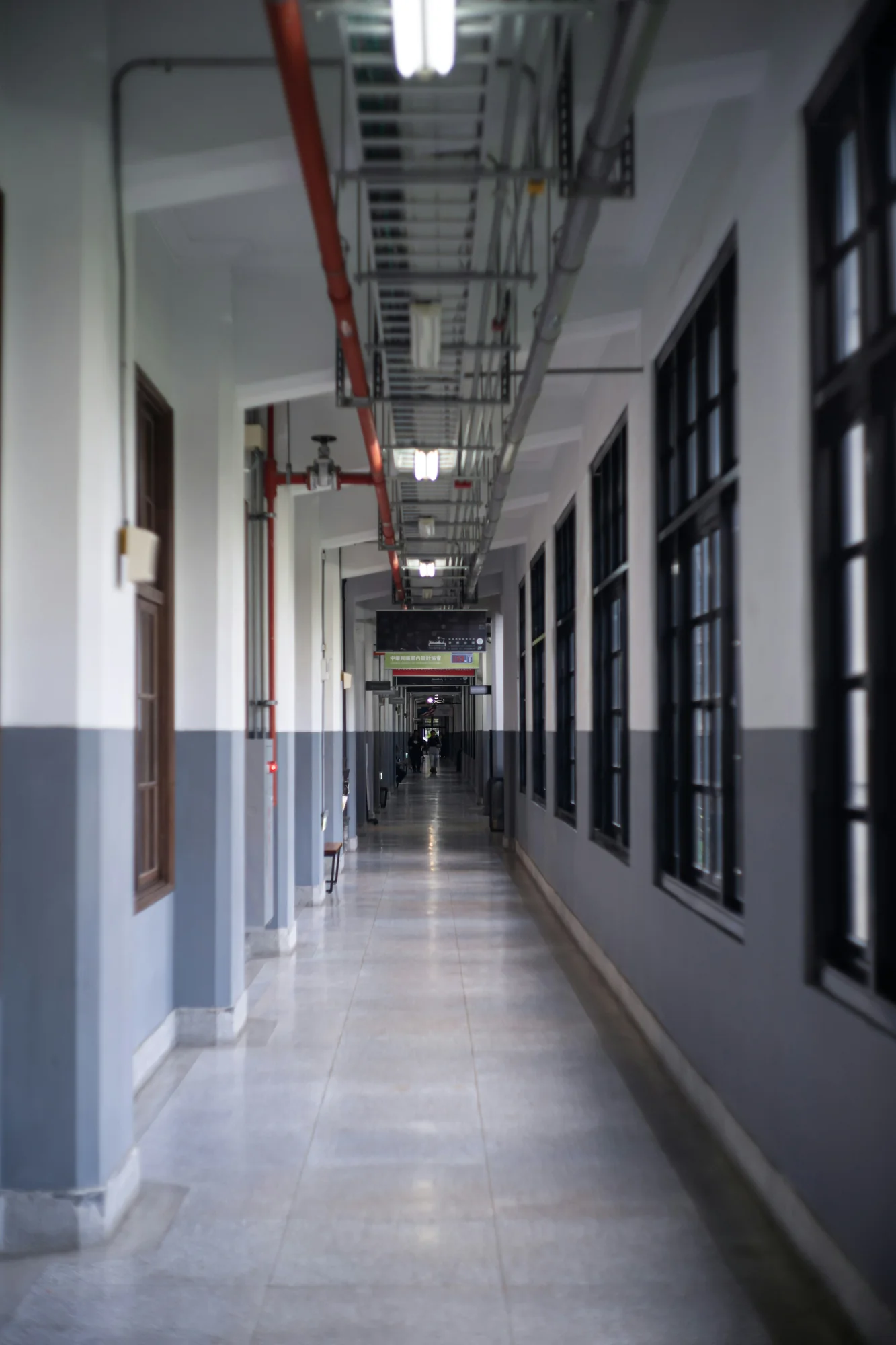 Light moving through a modern educational corridor